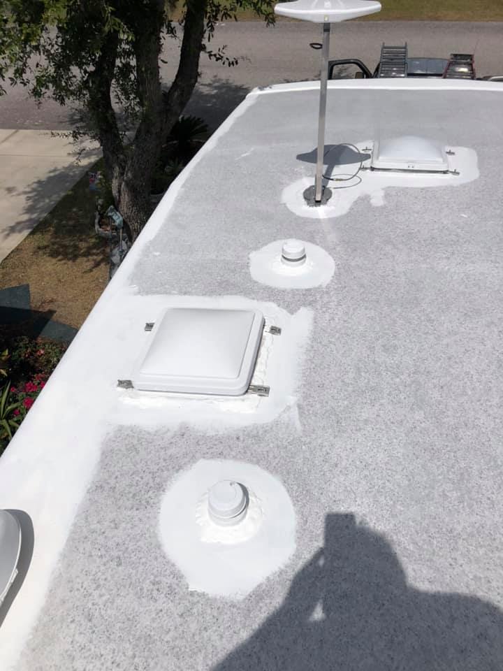 Resealed vents and skylight on RV roof